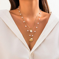 Ensemble de colliers multicouches tendance en alliage avec imitation perles, coquillages et étoiles de mer, style européen et américain, pour femmes