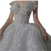Robe de mariée royale de luxe, coupe oversize, col cœur, en tulle blanc scintillant, avec corset orné de perles brodées à la main