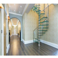 Escalier d'intérieur en colimaçon Design moderne en bois de chêne américain avec escalier circulaire incurvé en verre d'acier inoxydable