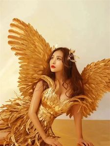 Costume d'ailes de fée en plumes dorées <span class=keywords><strong>pour</strong></span> femmes <span class=keywords><strong>pour</strong></span> <span class=keywords><strong>un</strong></span> look luxueux lors des carnavals et des festivals - Product Image 3