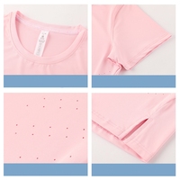 T-shirt de sport respirant Yutuo pour femme, idéal pour l'été, la course à pied et l'entraînement, avec fentes latérales, design réfléchissant et motif à pois, col rond