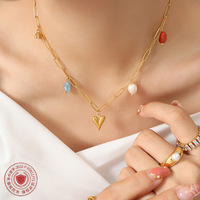 Collier créatif en acier titane plaqué or 18 carats avec perle d'eau douce, pendentif cœur et fleur de lotus, bijou botanique unique pour femme