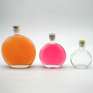 Bouteille en <span class=keywords><strong>verre</strong></span> de forme oblate transparente pour 250ml 500ml d'huile d'olive <span class=keywords><strong>25cl</strong></span> 50cl plat rond whisky brandy liqueur huile d'olive bouteille en <span class=keywords><strong>verre</strong></span> - Product Image 1