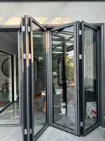Puerta Plegable de Aluminio Directo de Fábrica, Puerta de Vidrio Bi-Plegable Impermeable e Insonorizada de Tamaño Personalizado para Uso en Balcón de Viviendas y Villas