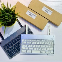 Keyboard dengan dudukan ponsel, ultra-tipis lipat Mini gigi biru 61 tombol nirkabel dengan dudukan yang dapat diisi ulang 2 lipat