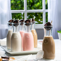 Ensemble de 4 carafes en verre transparent de 1 litre avec couvercle pour servir les boissons