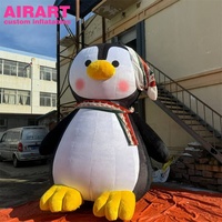Pingouins en peluche gonflables de décoration d'activité. Pingouin de Noël en peluche gonflable mignon pour le festival