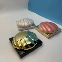Emballage de coussin d'air créatif conçu par Shell avec compartiments et emballage de poudre libre électrolytique