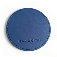 Sous-verre rond personnalisé pour événements d'entreprise, avec logo et texte en relief, en cuir PU cousu de qualité supérieure, idéal comme cadeau d'affaires