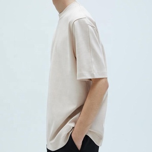 เสื้อยืดคอกลมผู้ชายผ้าฝ้าย 100% แฟชั่นทรงหลวมไหล่ตก เสื้อยืดโอเวอร์ไซส์เนื้อหนาสีพื้น ขายส่ง - Product Image 1