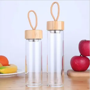 पोर्टेबल डिजाइन ग्लास थर्मो उच्च Borosilicate ग्लास पानी की बोतल के लिए फिर से भरना के लिए आउटडोर बांस ढक्कन के साथ