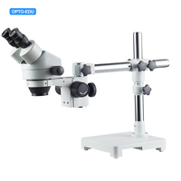 Microscope stéréoscopique zoom binoculaire OPTO-EDU A23.3645-STL1 7x-45x avec support de bras 0.7x-4.5x pour l'électronique et les circuits imprimés