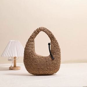 Sac à main en paille tressée pour femme, nouveau style, couleur unie, avec pompon, idéal pour les vacances à la plage et les loisirs en bord de mer - Product Image 2