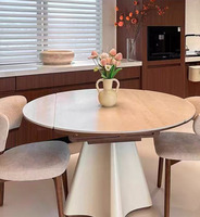 Table à manger convertible contemporaine avec plateau en ardoise et base sculpturale