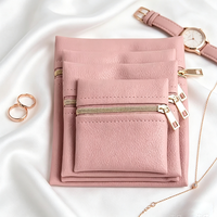 Pochette de voyage portable en cuir PU végétalien de luxe avec logo personnalisé pour cosmétiques, mini tube de brillant à lèvres, sac à maquillage zippé, vente en gros de bijoux
