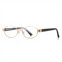 Lunettes anti-lumière bleue 3165, monture optique ovale à branches larges en fil doré, style chic original, motif géométrique