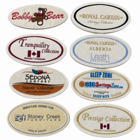 Étiquette de matelas brodée sur mesure en tissu feutre avec logo de marque canadienne, nouveau style, haute qualité, surjetée, vente en gros