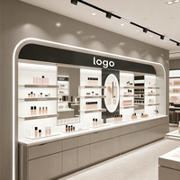 Vitrine de présentation de cosmétiques sur mesure de haute qualité pour salons de beauté et magasins commerciaux – Comptoir de présentation noir/blanc pour maquillage et soins de la peau