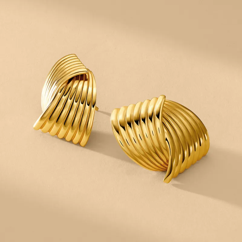Elegant 18 Karat vergoldeter Edelstahl strukturierte schneidende Ohr stecker Frauen Luxus hypo allergene CC Ohrringe Schmuck