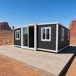 Maison préfabriquée extensible SUNRISE avec terrasse latérale, 3 chambres, salle de bain et cuisine, prête à l'emploi pour une habitation confortable. - Product Image 1