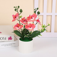 Fleur artificielle de phalaenopsis en pot, petite composition pour décoration de salon, meuble TV, véranda, ou pour décorations de mariage.