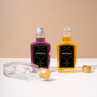 Vente en gros directe du fabricant : bouteille de boisson en verre plat transparente vide de 200 ml pour emporter avec bouchon à vis