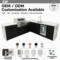 Îlot de cuisine extérieur en forme de L en quartz noir mat et blanc avec barbecue à gaz 5 brûleurs, réfrigérateur, évier en acier inoxydable et système électronique