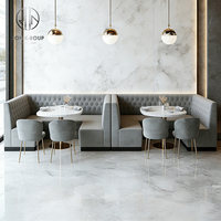 Mobilier de café et restaurant : banquette incurvée en marbre, chaise, table, canapé