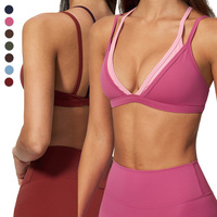 Soutien-gorge de sport EWX6116-1 tendance avec bretelles contrastées et doubles, design à armatures, col en V et coussinets amovibles