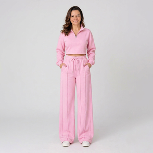 Conjunto deportivo informal de top corto rosa con media cremallera y pantalones anchos con cordón para mujer - Product Image 1