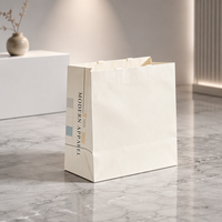 Sac en papier blanc personnalisé pour magasin de vêtements de mode, sac cadeau en papier artistique personnalisé