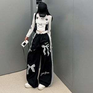 Ensemble Fille Printemps 2025 Nouvelle Édition Coréenne Haut en Dentelle à Nœud avec Cordon Intégré et Pantalon Américain à Jambes Larges pour Enfants Moyens et Grands - Product Image 5