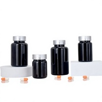 Bouteille d'emballage alimentaire santé 120 cc, design cylindrique noir, bouchon double ligne argenté, idéale pour capsules et poudres, petite taille