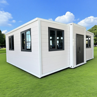 Maison conteneur grise modulaire pliable, système de déploiement rapide hydraulique, serre en panneaux sandwich en acier galvanisé, garantie 4 ans
