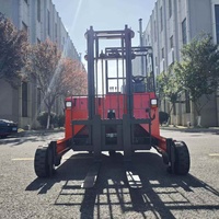 Chariot élévateur électrique tout-terrain 2 tonnes à batterie lithium 2000 kg pour entrepôt et terrains accidentés