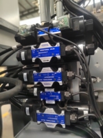 Machines de moulage par injection de pièces en céramique d'alumine pressées à sec verticales de 120t, prix des machines de moulage plastique Hm0179-27