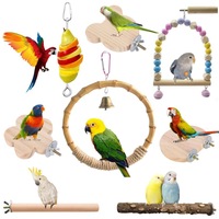 De nombreux types de jouets pour oiseaux Swing, cloche, planche à aiguiser, poteau debout un ensemble de huit pièces avec plusieurs options