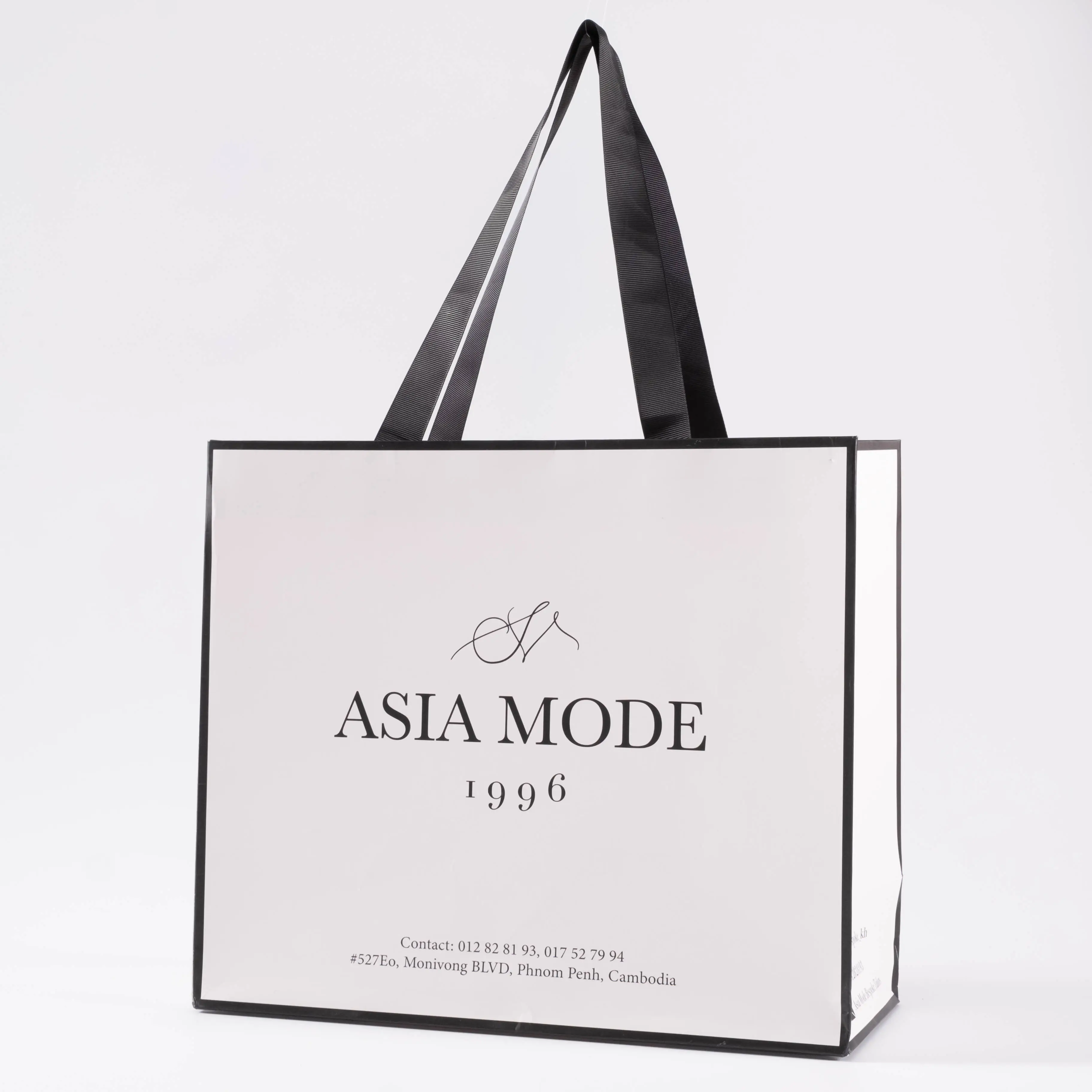 Wholesale Custom Sizes Portable Paper Bag Reusable White Paper Shopping Bags With Logos Custom Printing