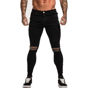 Pantalones vaqueros de mezclilla 100% algodón para hombre al por mayor, estilo casual, de cintura alta, desgastados, transpirables, lisos, con efecto lavado y rotos. - Product Image 1