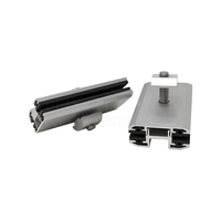 Kit de fixation intermédiaire pour module à double vitrage à film mince, adapté aux panneaux solaires sans cadre