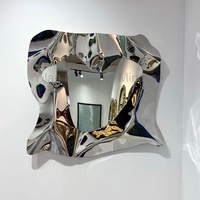 Miroir Halo moderne italien par Boca Do Lobo, miroir mural sculpté avec cadre en acier inoxydable de luxe pour la décoration de villa