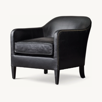 Chaise club en cuir de smoking français des années 1950 inspirée de la campagne de conception Sassanid et de l'ameublement Safari