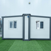 Maison conteneur extensible à double aile blanche de 20 pieds, neuve, pour dortoir préfabriqué en vrac pour chantier de construction et camp minier