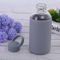 Bouteille d'eau portable en verre borosilicate de 580 ml, design moderne fait main, marque PSC, pour boire directement, voyage, sport, avec silicone