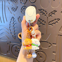Hot verkopende schattige cartoonhond sleutelhanger in koppelstijl van hars, met schattig huisdierfiguurtje als dagelijks accessoire voor dierenliefhebbers.