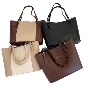 Bolsos de mano de lujo de piel sintética para mujer, a la moda, con costuras de marca y colores variados, para pedidos al por mayor RTS - Product Image 1