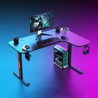 Bureau de jeu professionnel extensible en forme de L avec éclairage LED RGB, surface en fibre de carbone et structure métallique pour PC et usage bureautique