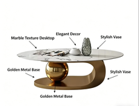 Table basse moderne et créative en verre à motif aquatique et marbre, avec structure métallique, pour salon
