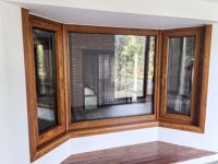 Rideau à persiennes inclinable vers l'intérieur avec revêtement en aluminium pour fenêtre de baie et arc, à rupture thermique fixe et vitrée pour application d'entrée