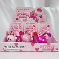 Nouvel arrivage de porte-clés poupée douce mignonne endormie huile pour les lèvres magique Pom Pom 2 en 1 avec rouge à lèvres liquide ensemble de lèvres cadeau de maquillage